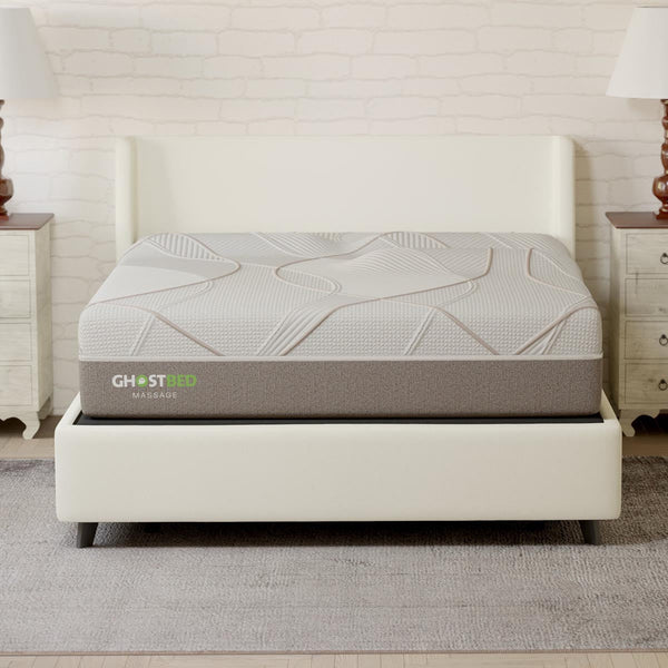 GhostBed 12-inch queen massage foam mattress on floor, showcasing plush surface and supportive design for restful sleep.