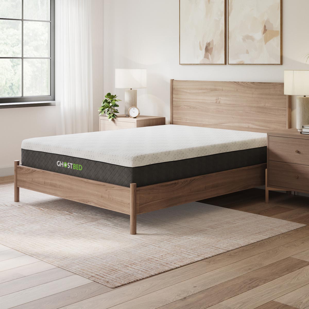 GhostBed 11-inch Heritage Hybrid mattress in twin size with memory foam and innerspring layers, showing the plush surface and detailed stitching.