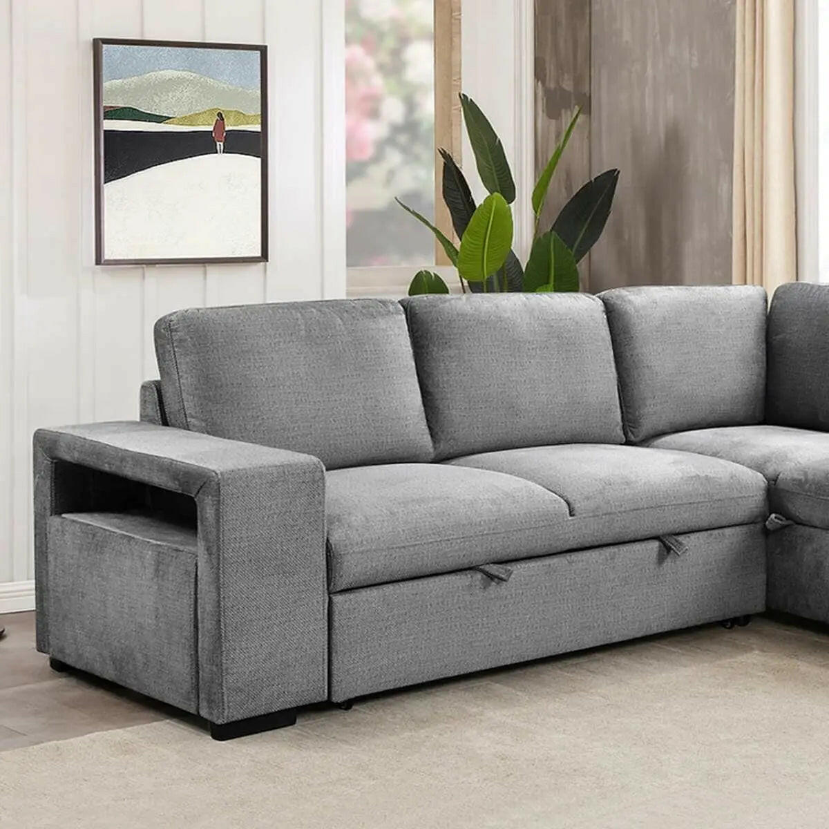 Grey IFF Valencia sectional sleeper sofa with matching ottoman, showcasing a modern, comfortable living room setup.