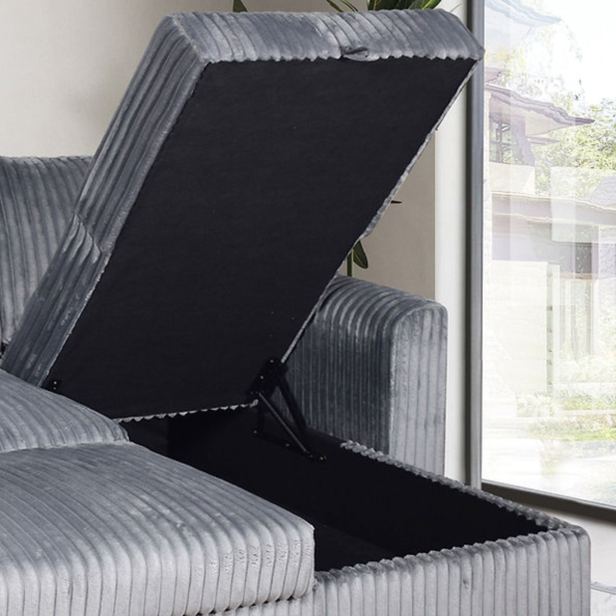 Grey IFF Sutton reversible chaise sectional sleeper with fabric upholstery, featuring a modern design and comfortable sleeping surface.