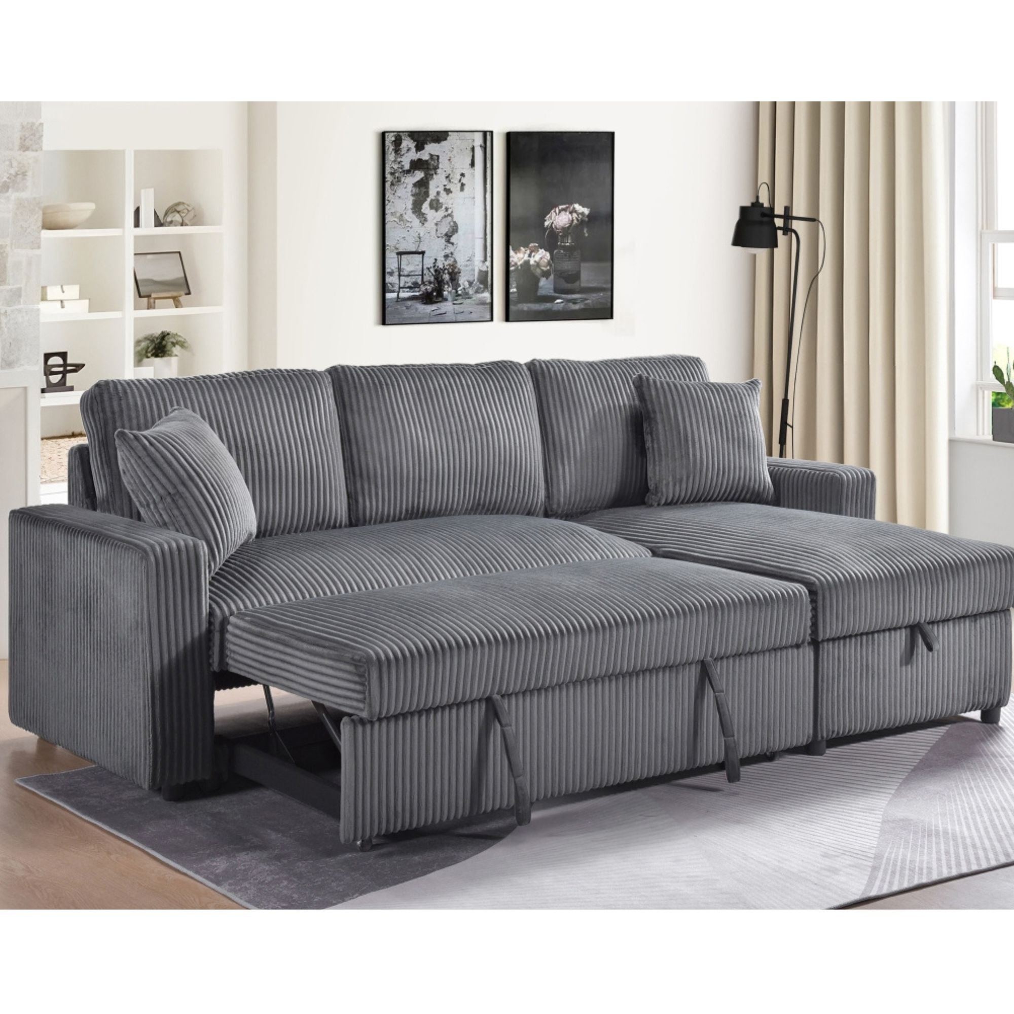MAZ Brecker 2-piece reversible sectional sleeper in dark grey with cushioned seats and backrests, showing the convertible design.