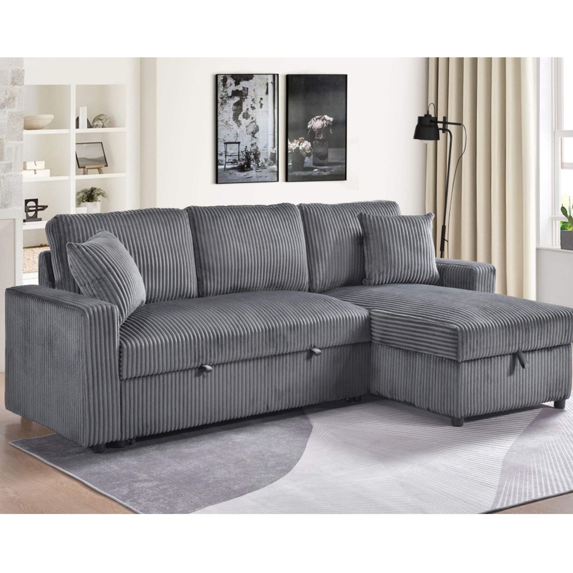 MAZ Brecker 2-piece reversible sectional sleeper in dark grey showing plush fabric and modern design with convertible sofa and bed features.