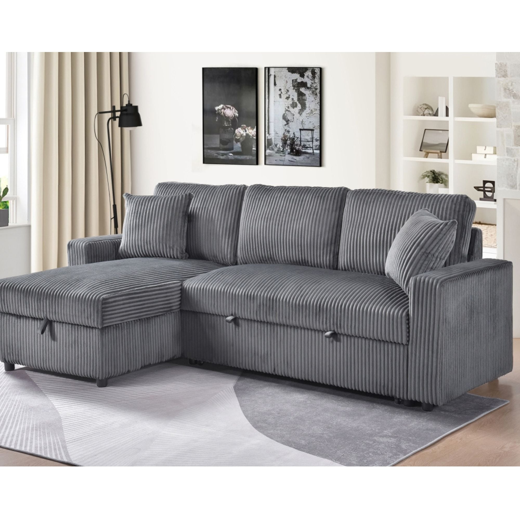 MAZ Brecker 2-piece reversible sectional sleeper in dark grey, showcasing the plush fabric and modern design of the sofa.