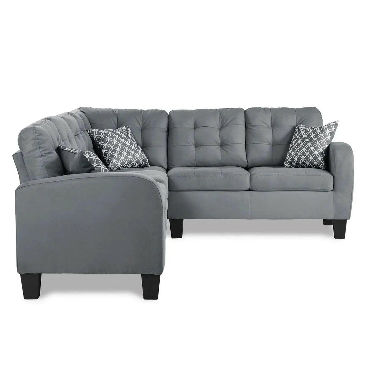 Gray reversible sectional sofa by MAZ, featuring plush cushions and modern design, shown in a spacious living room setting.