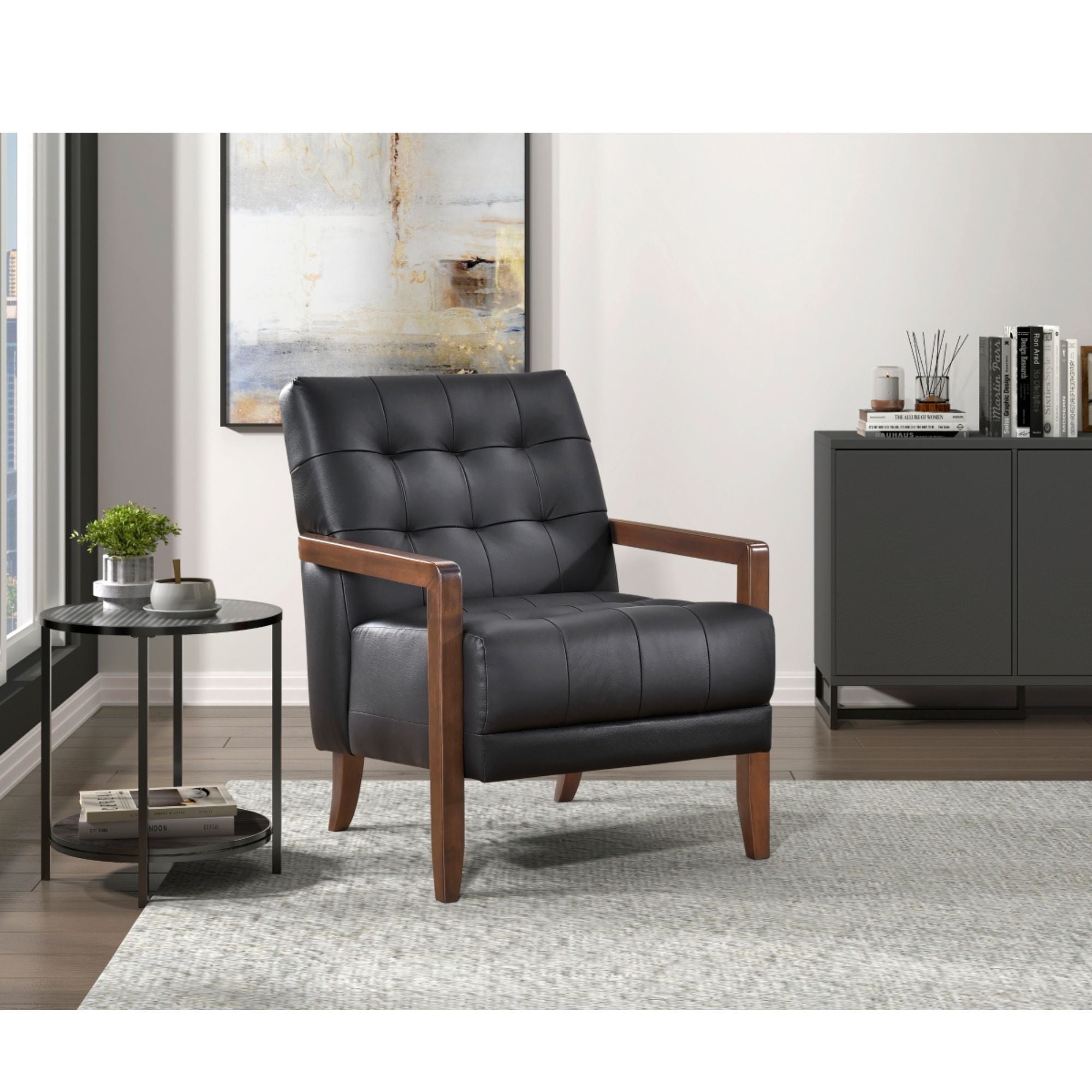 Black Crafton leather accent chair by MAZ with sleek modern design, featuring a cushioned seat and stylish armrests.