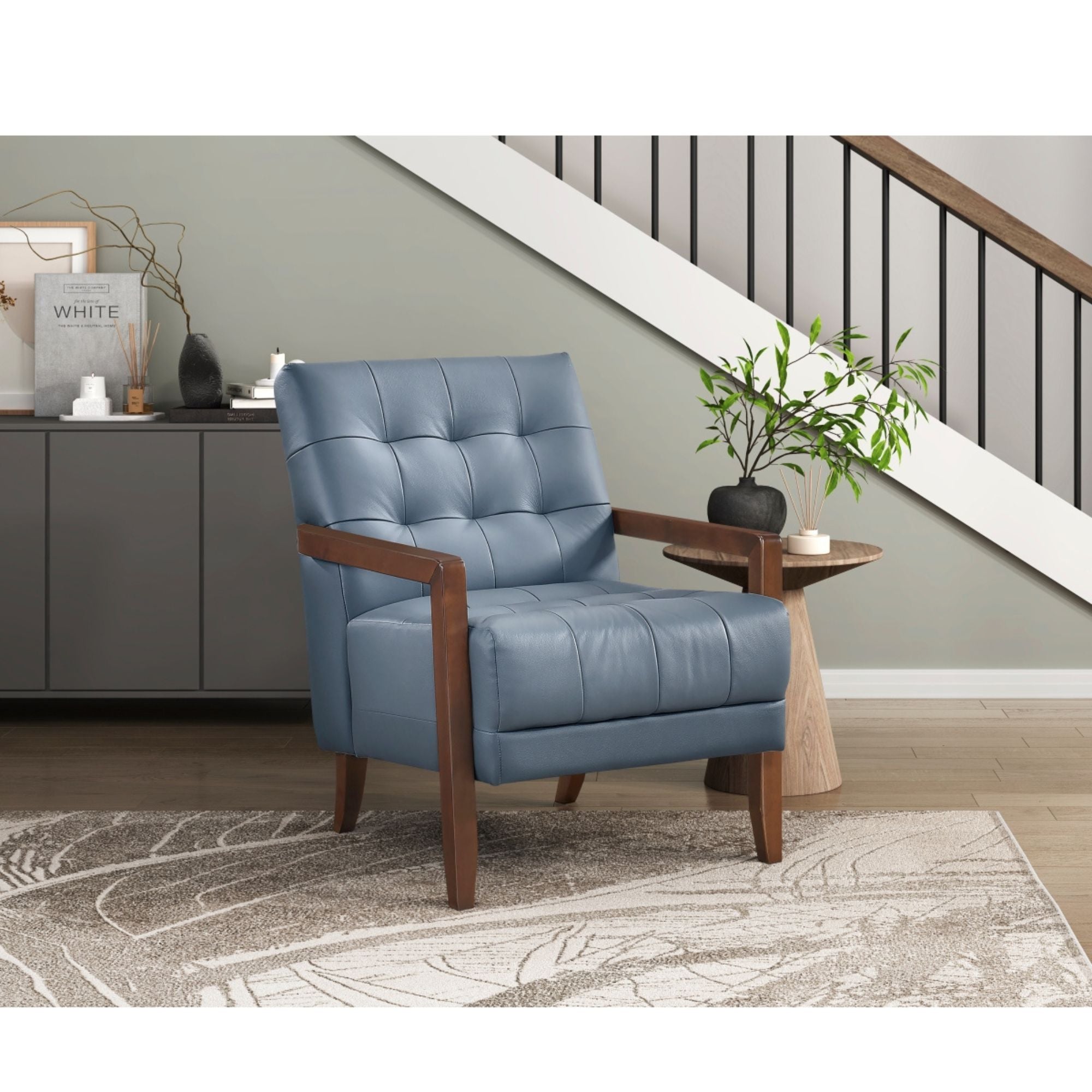 Blue Crafton leather accent chair by MAZ with sleek design and plush cushioning, ideal for modern living spaces.