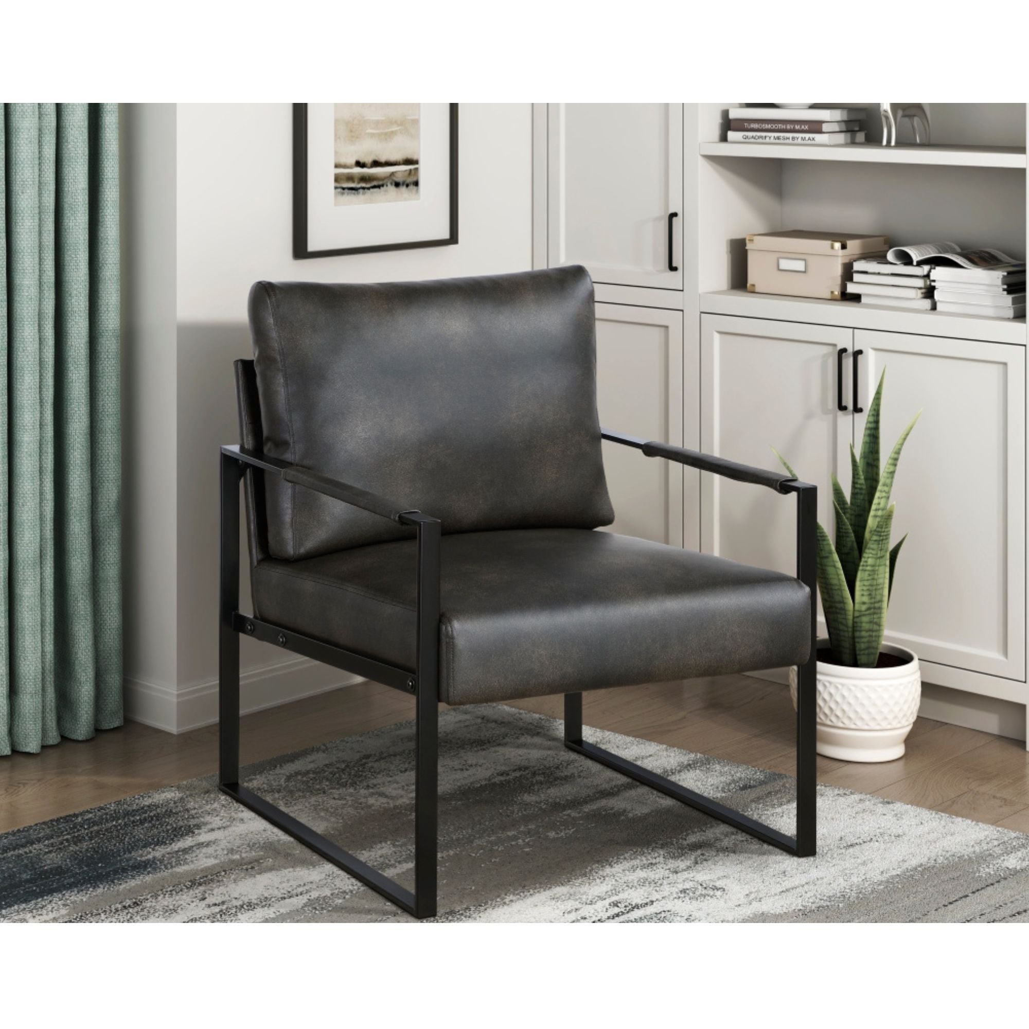 Dark grey faux leather accent chair from the MAZ Trent Collection, modern design with cushioned seating and sleek legs.