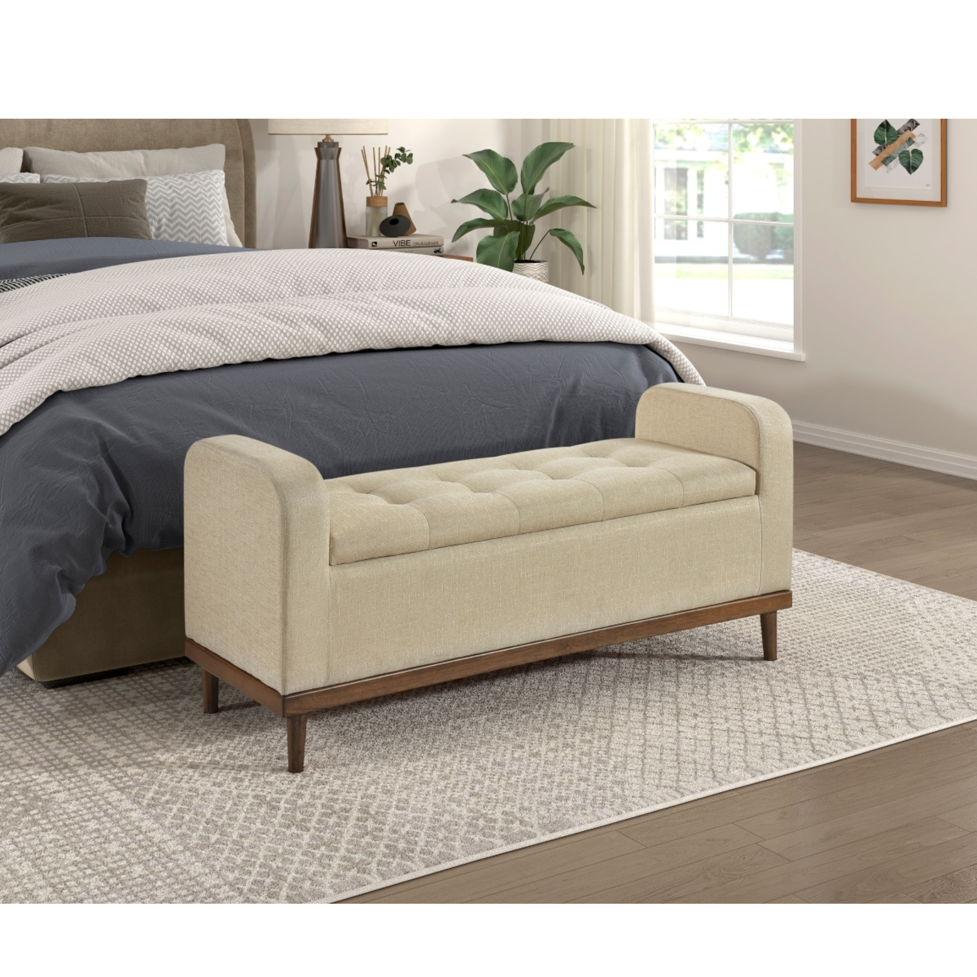 Beige MAZ Brigitte lift-top storage ottoman with fabric upholstery, functional storage space, and modern design.