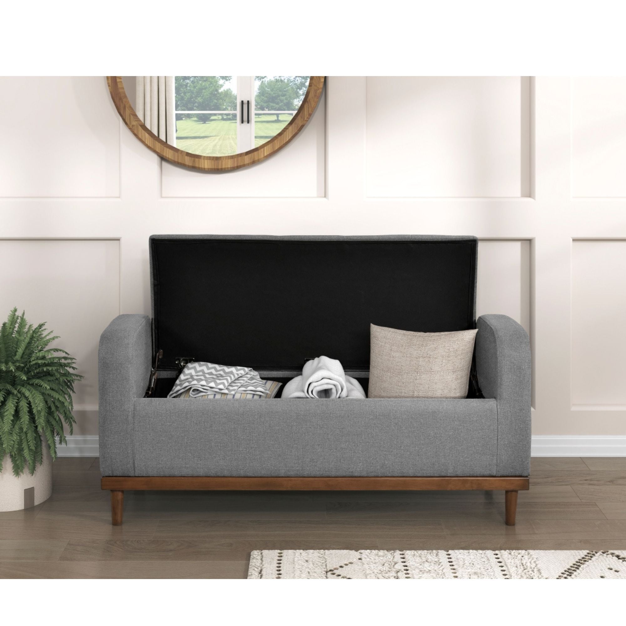 Gray fabric MAZ Brigitte Collection lift-top storage ottoman with spacious interior and modern design.