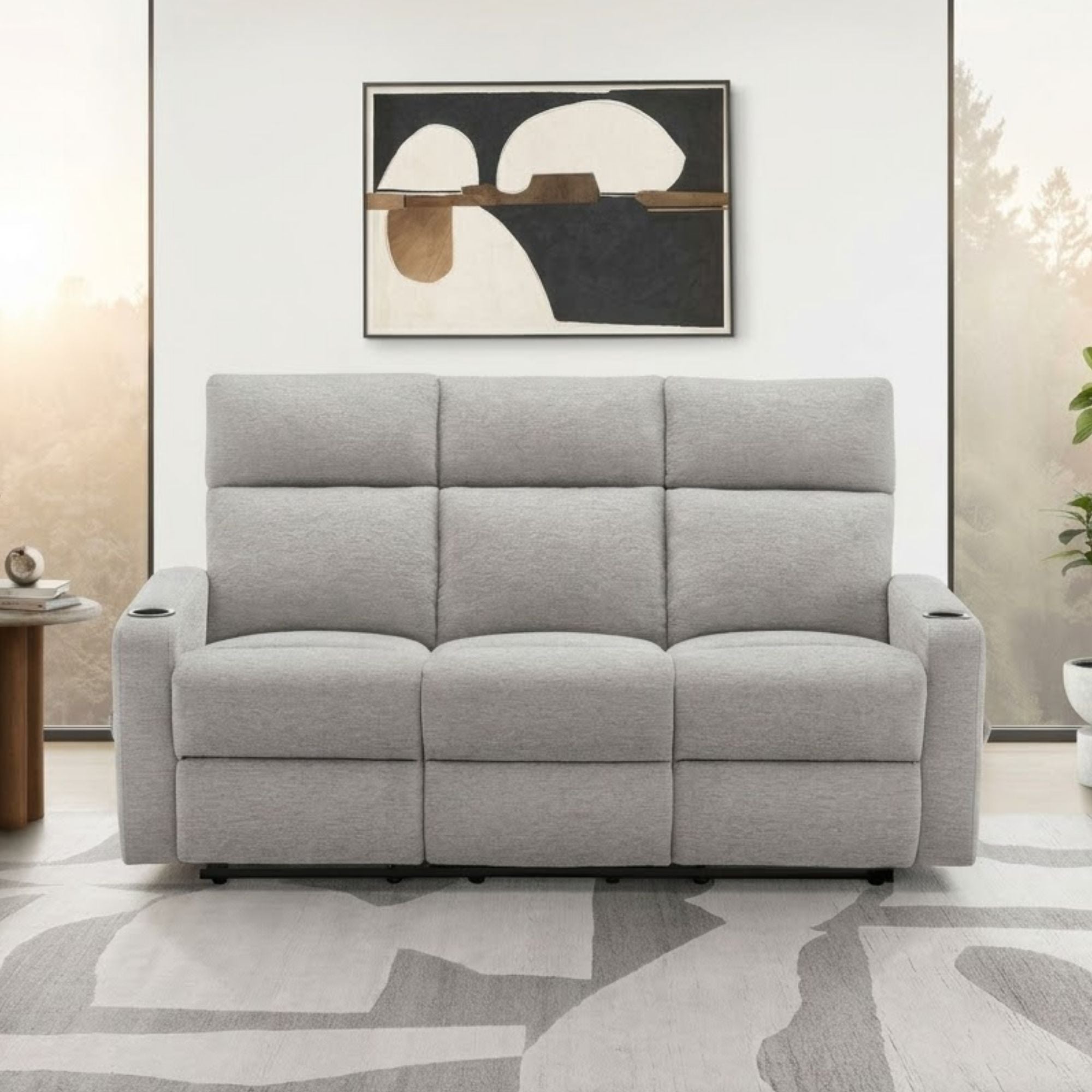 Light grey Monarch Specialties Arden reclining sofa with built-in cupholders and plush cushions, perfect for relaxing in style.