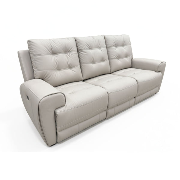 Brassex Nola Power Recliner Sofa in taupe fabric with plush cushions and reclining features, ideal for comfortable living room seating.