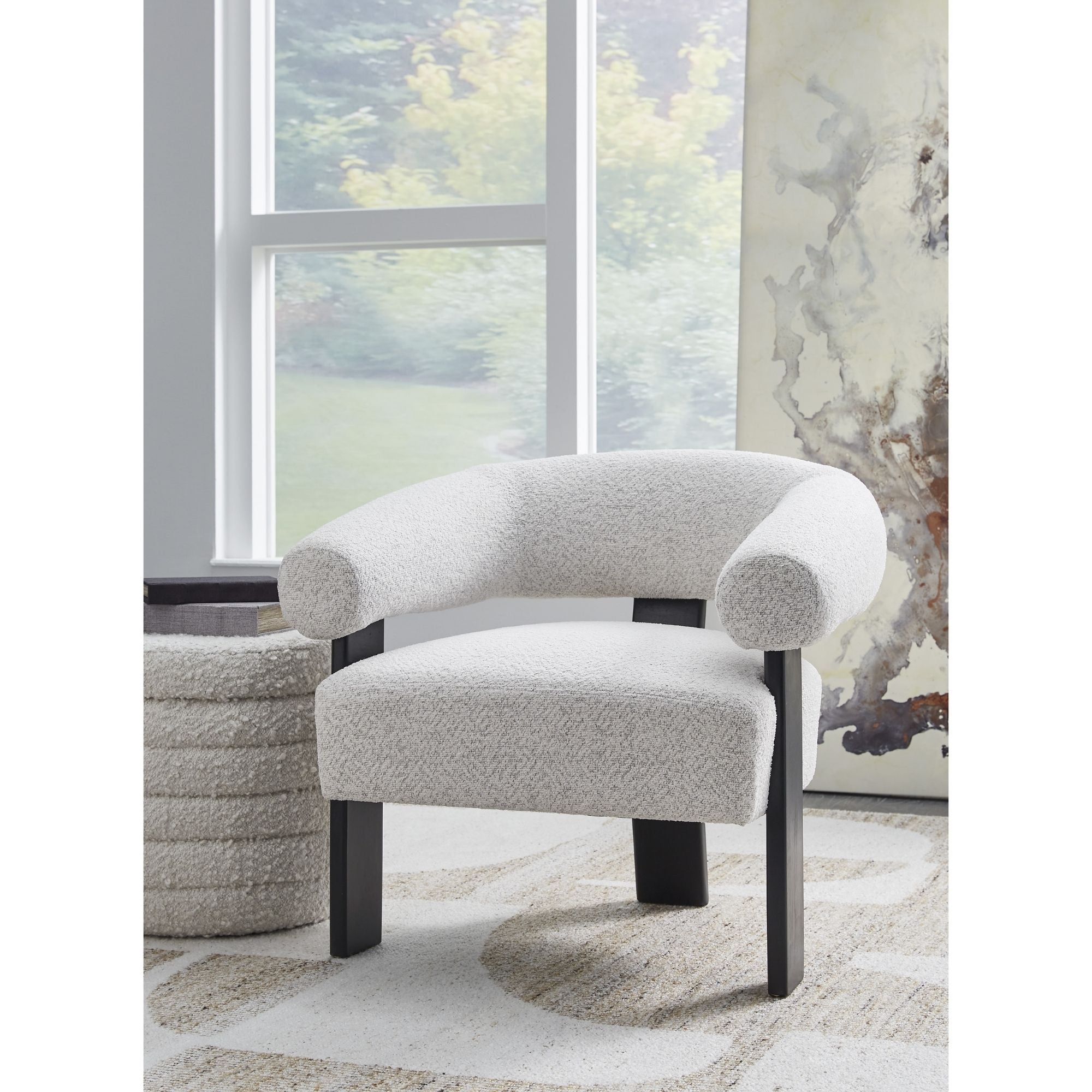Ashley Dultish Accent Chair by Signature Design Ashley, featuring plush upholstery and stylish armrests in a modern accent chair design.