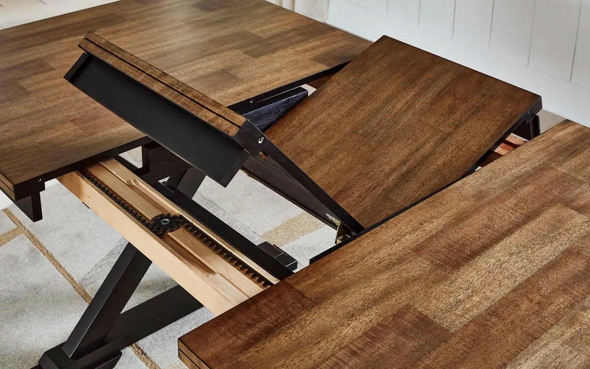 Signature Design by Ashley Wildenauer RECT dining table with extendable leaf, showcasing wood finish and detailed tabletop design.