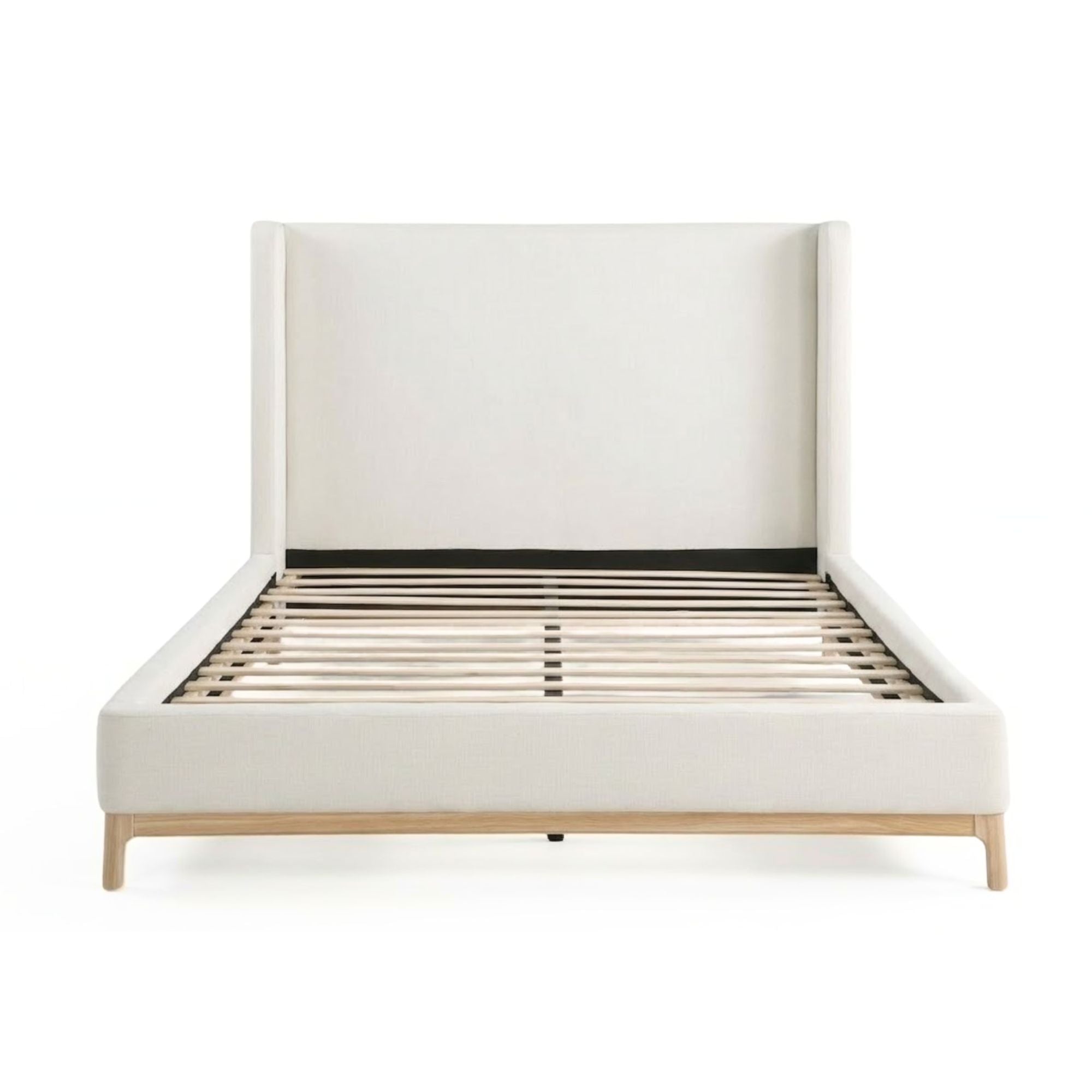 Brassex Serene upholstered platform bed with a padded headboard and neutral fabric, showcasing a modern bedroom design.