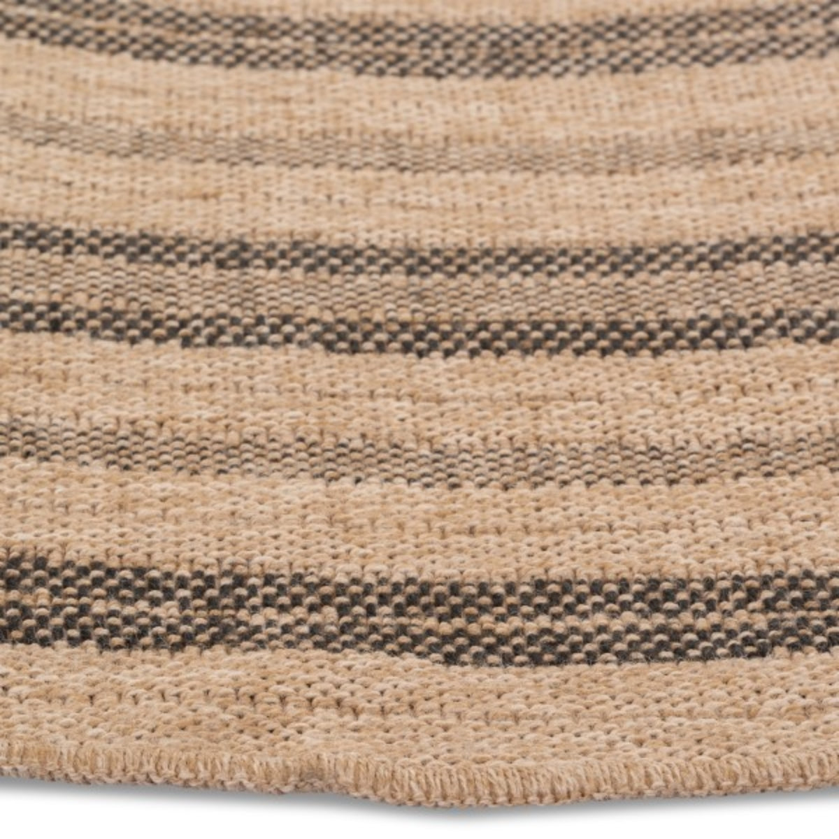 Black round indoor outdoor rug by Viana Inc, featuring a circular design perfect for any living space or outdoor area.