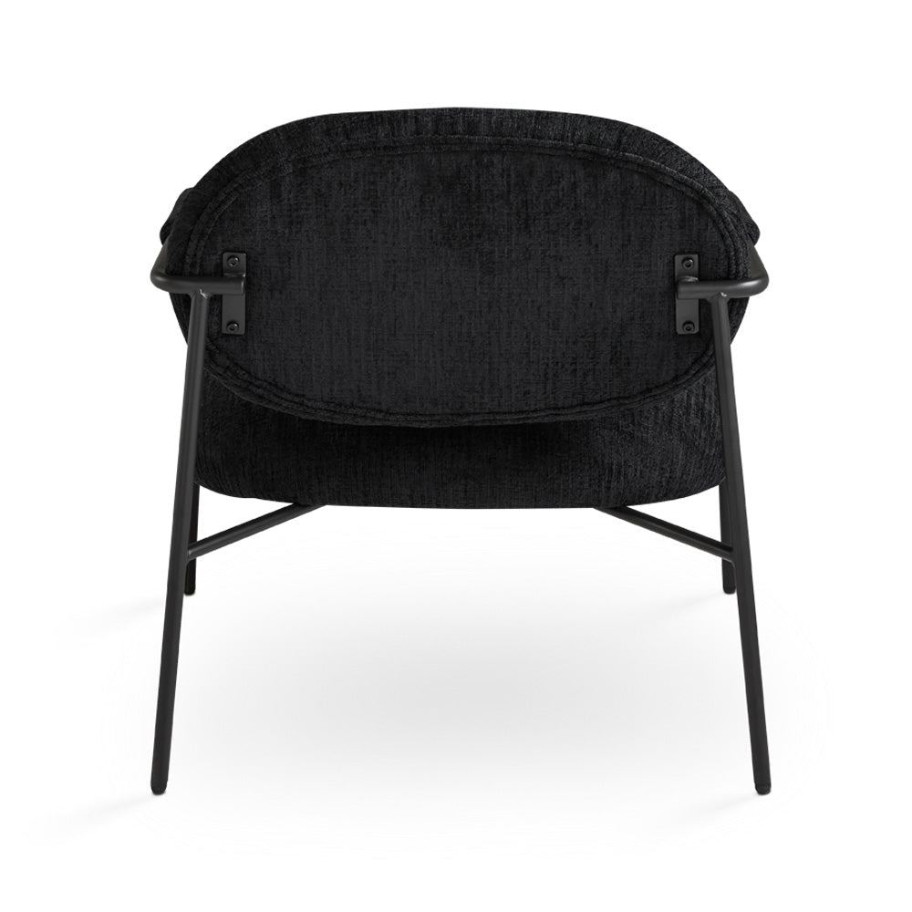 Black Alvin accent chair by Xcella with plush upholstery and sleek modern design, shown with comfortable seat and stylish armrests.