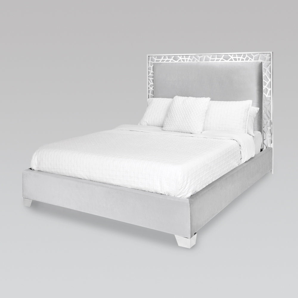 Xcella Wellington Bed floor model in grey velvet with a modern frame, showcasing a stylish and comfortable bedroom centerpiece.