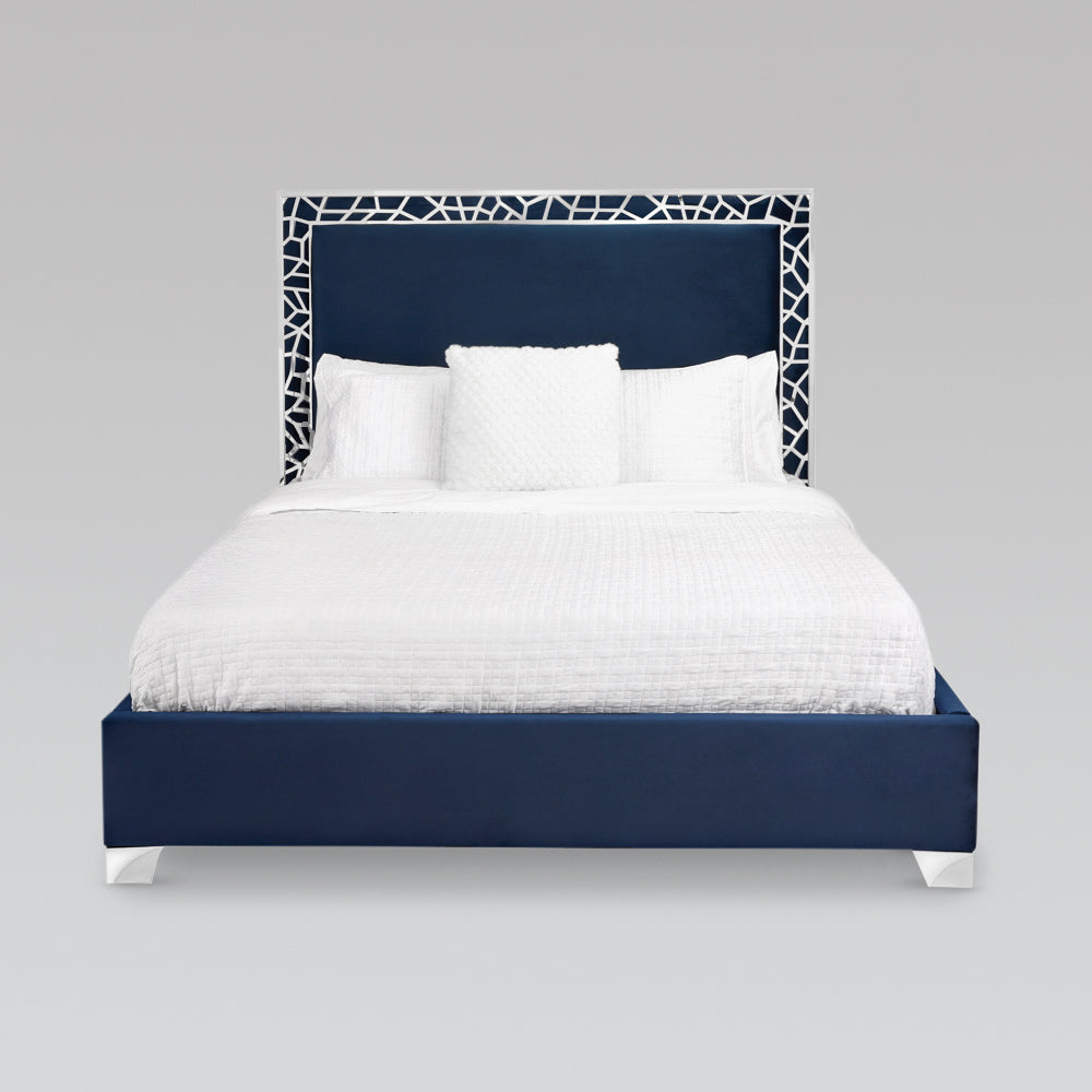 Xcella Wellington bed with blue velvet upholstery, featuring a stylish headboard and modern bed frame design.