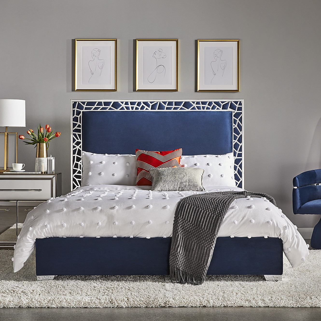 Xcella Wellington Bed with a modern wooden frame and neutral-colored bedding, shown in a contemporary bedroom setting.