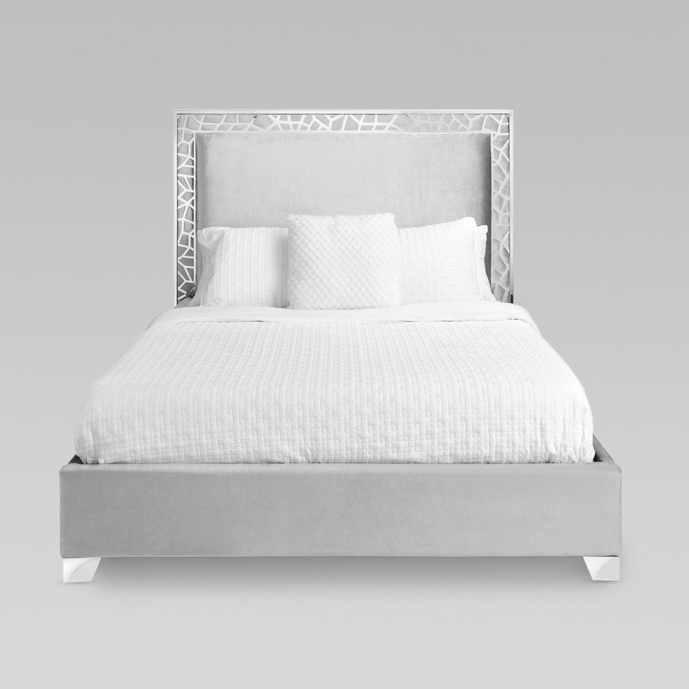 Xcella Wellington Bed in grey velvet with a padded headboard and modern design, shown in a stylish bedroom setting.