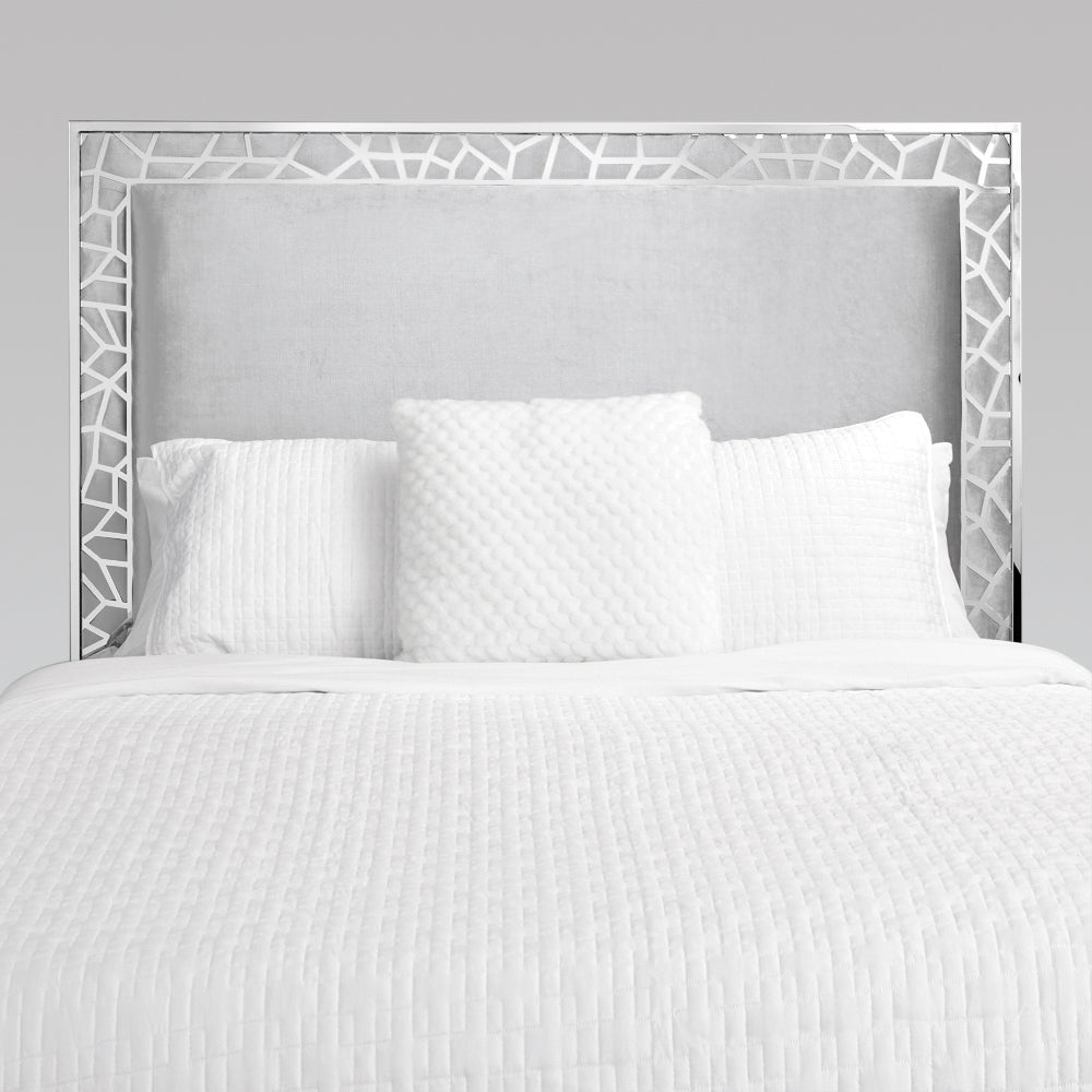 Grey velvet Wellington bed with a plush headboard, featuring clean lines and modern design by Xcella.