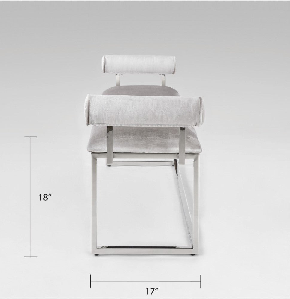 Xcella Serena Bench with grey upholstery and silver legs, shown from a side view, ideal for entryways or living spaces.