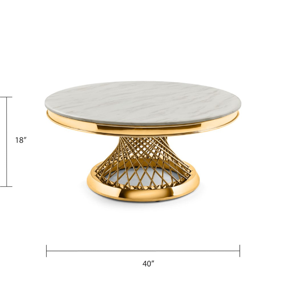 Xcella Bailey coffee table with a sleek gold finish and modern design, shown in a well-lit living room setting.