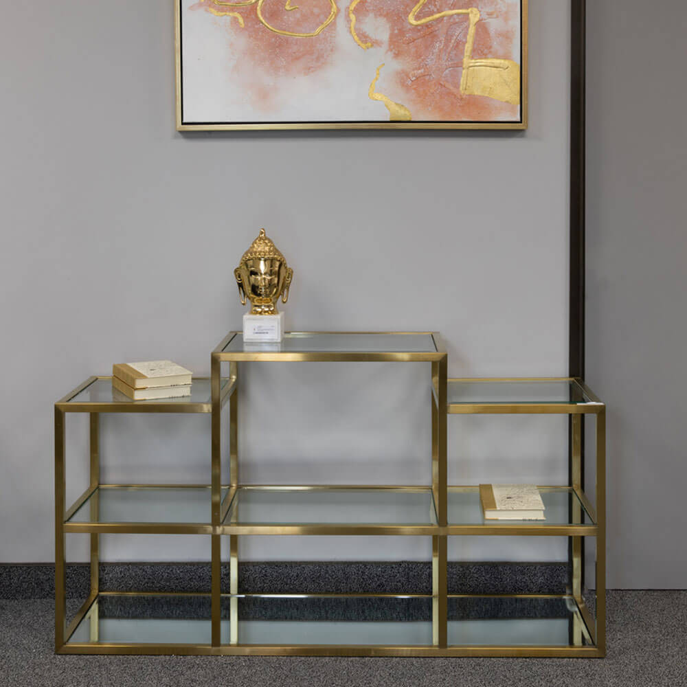 Xcella Geneva multi-level gold console table with sleek design and multiple tiers, ideal for modern entryways and living rooms.