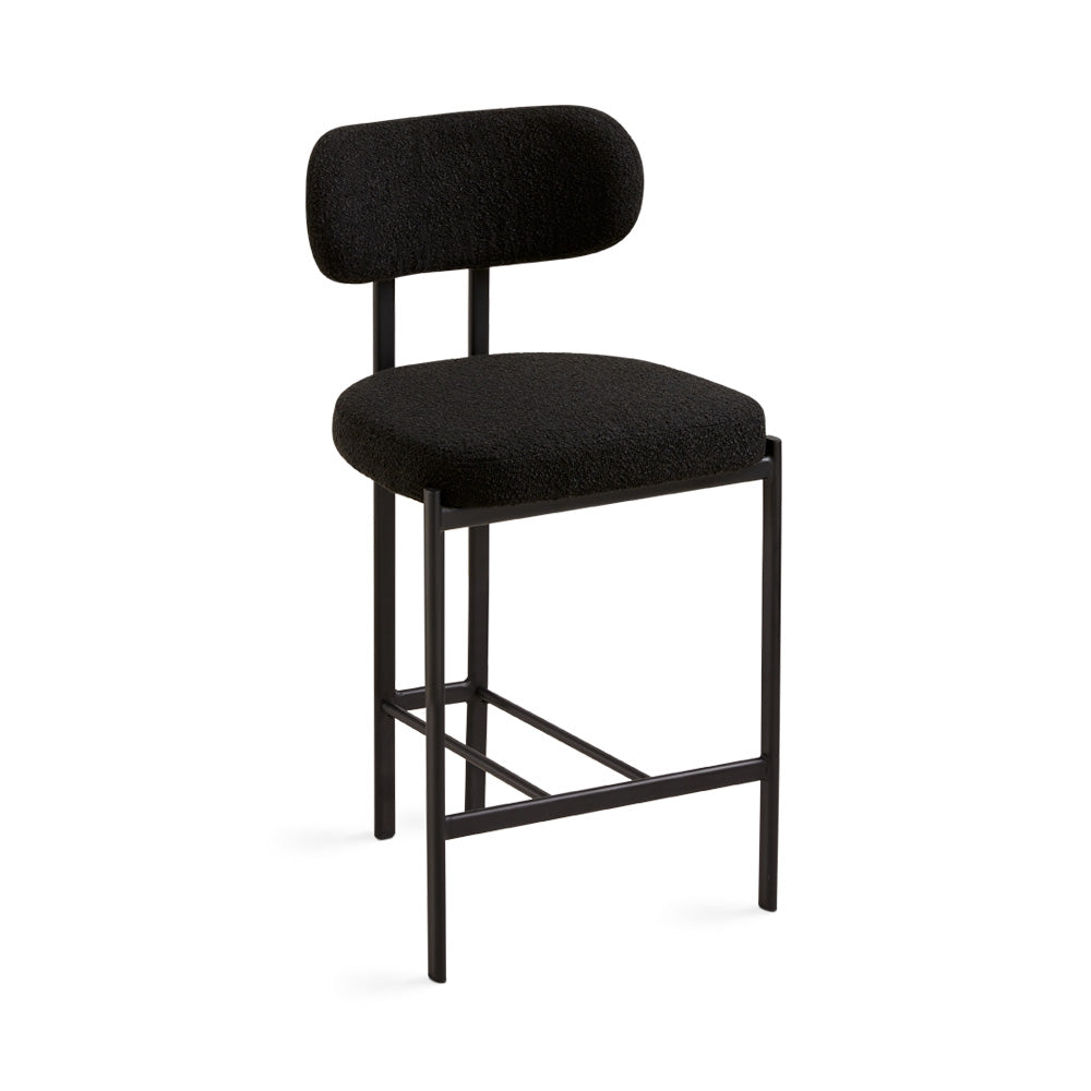 Black Otis Counter Chair by Xcella, showcasing its sleek design and comfortable seating for kitchen or bar areas.