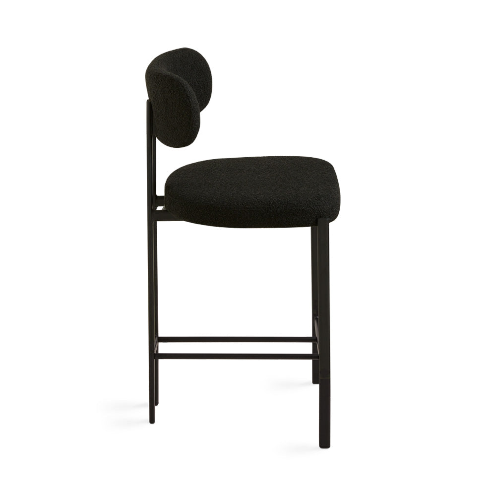 Black Otis counter chair by Xcella with a modern design, featuring a sleek black seat and sturdy metal legs.