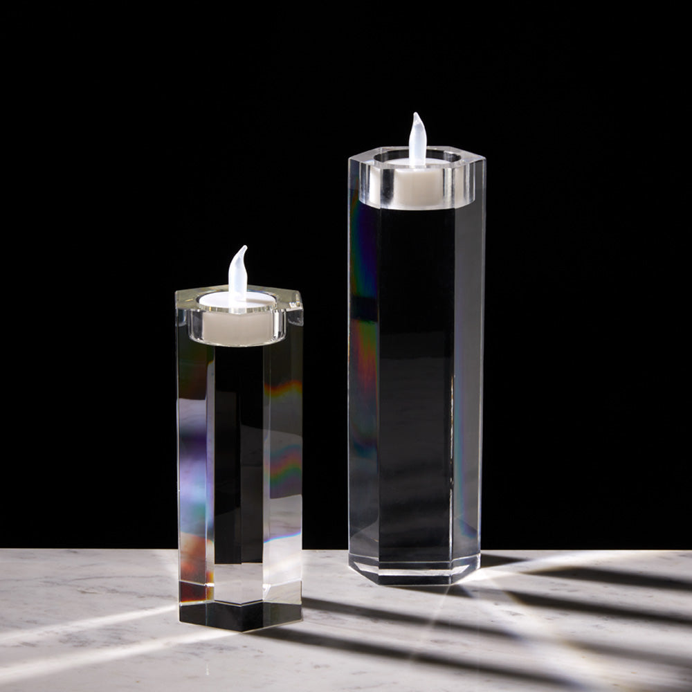 Set of two acrylic candle holders by Xcella displayed on a stylish decor setup, showcasing modern transparent design.
