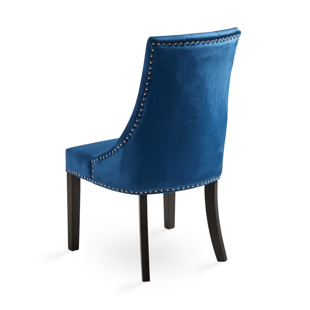 Set of two Rimzy Wood Dining Chairs in blue by Xcella, showcasing modern wood design and comfortable blue upholstered seats.