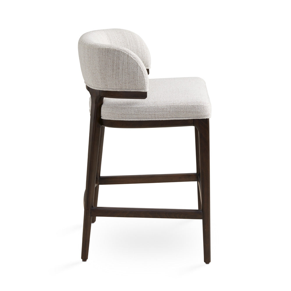 Xcella Chanler Grey Counter Chair for dining, side view showing modern design and upholstered grey fabric.