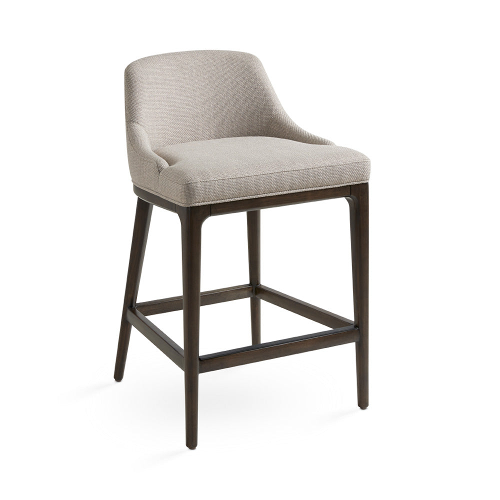 Xcella Everett counter chair with grey linen upholstery and wooden legs, showcasing a stylish and comfortable dining seat.