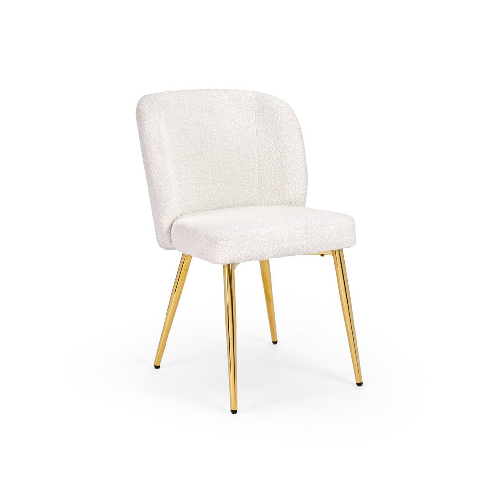 Xcella Paloma 5-piece dining room set with a gold glass table and four matching chairs, modern and elegant for dining space.
