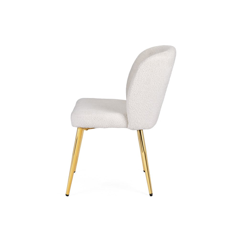 Xcella Paloma 5-piece dining set with ivory and gold finish, includes dining table and matching chairs in a stylish contemporary design.