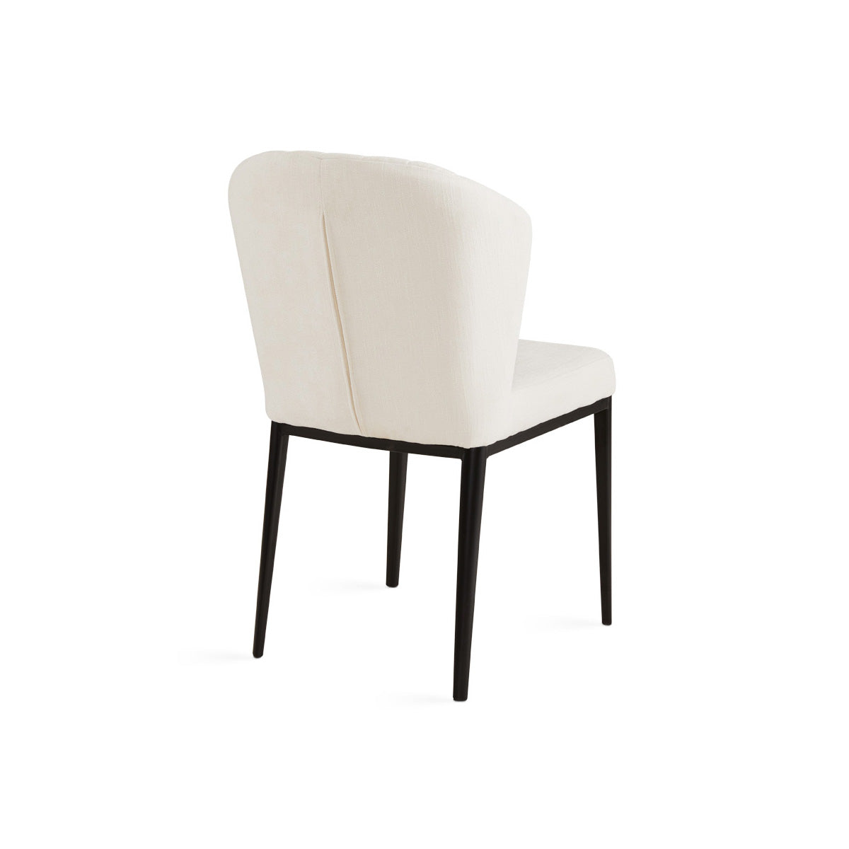 Set of two ivory shell-shaped dining chairs by Xcella, showing the back and linen upholstery in a three-quarter view.