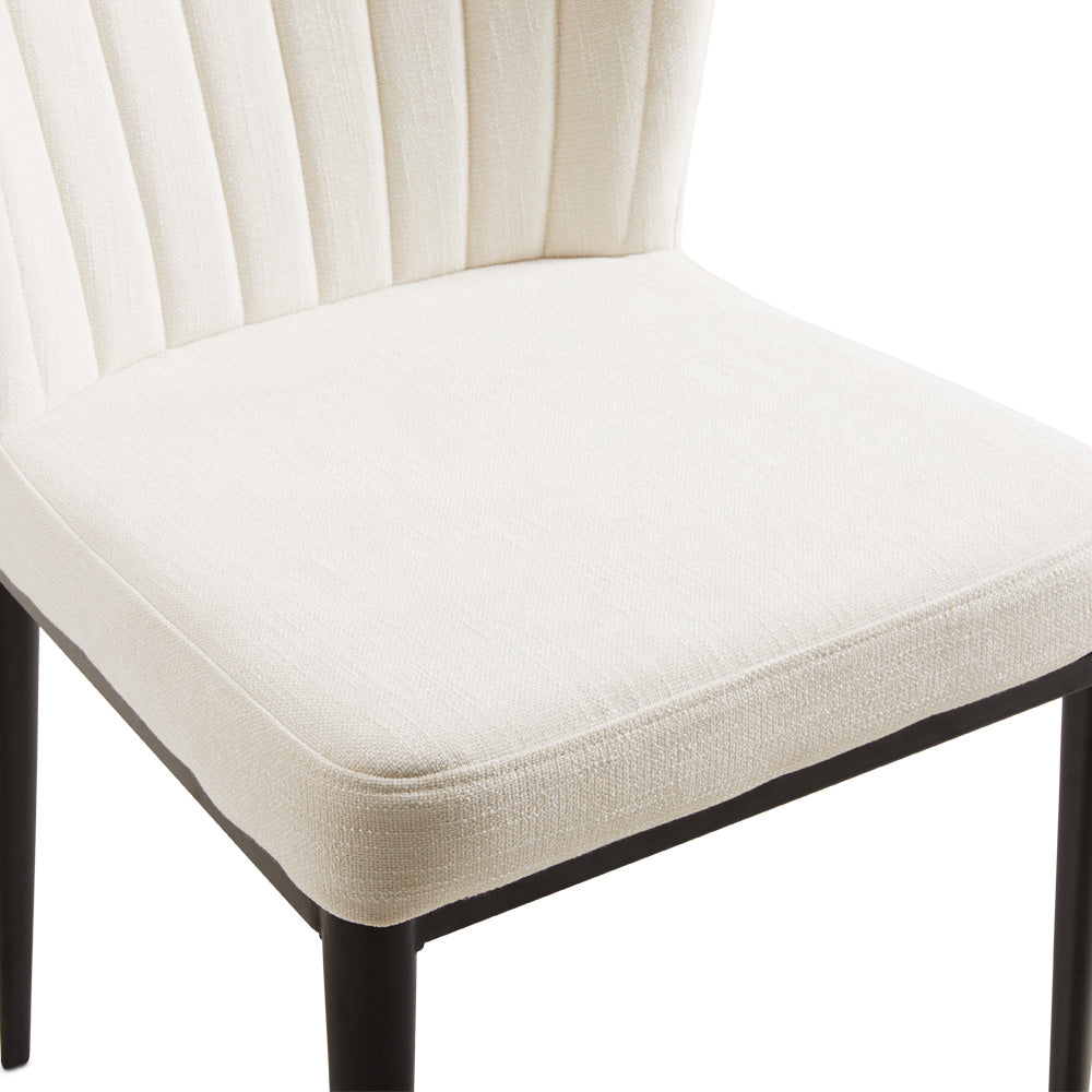 Set of two Xcella shell-shaped dining chairs with ivory linen seats, modern design for elegant dining rooms.