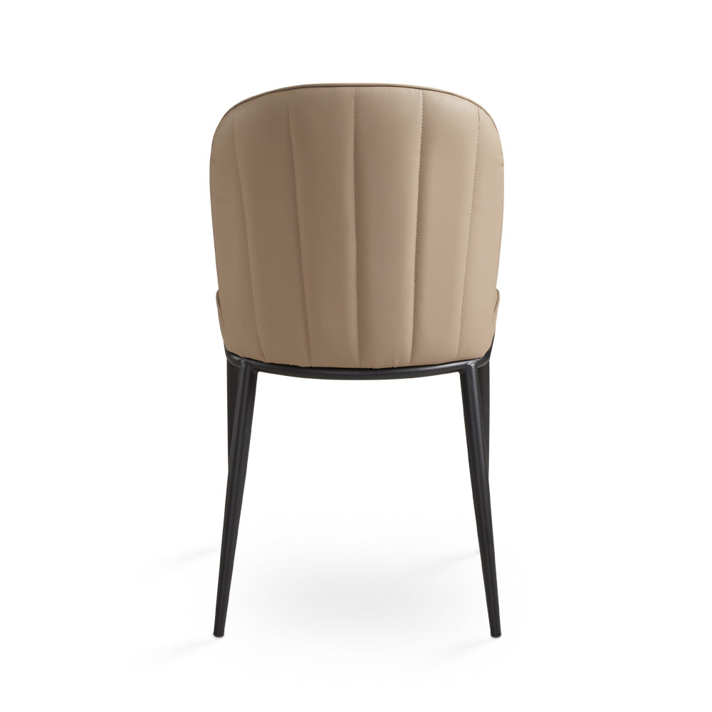 Xcella Angie dining chair with a sleek modern design, featuring a cushioned seat and stylish wooden legs.