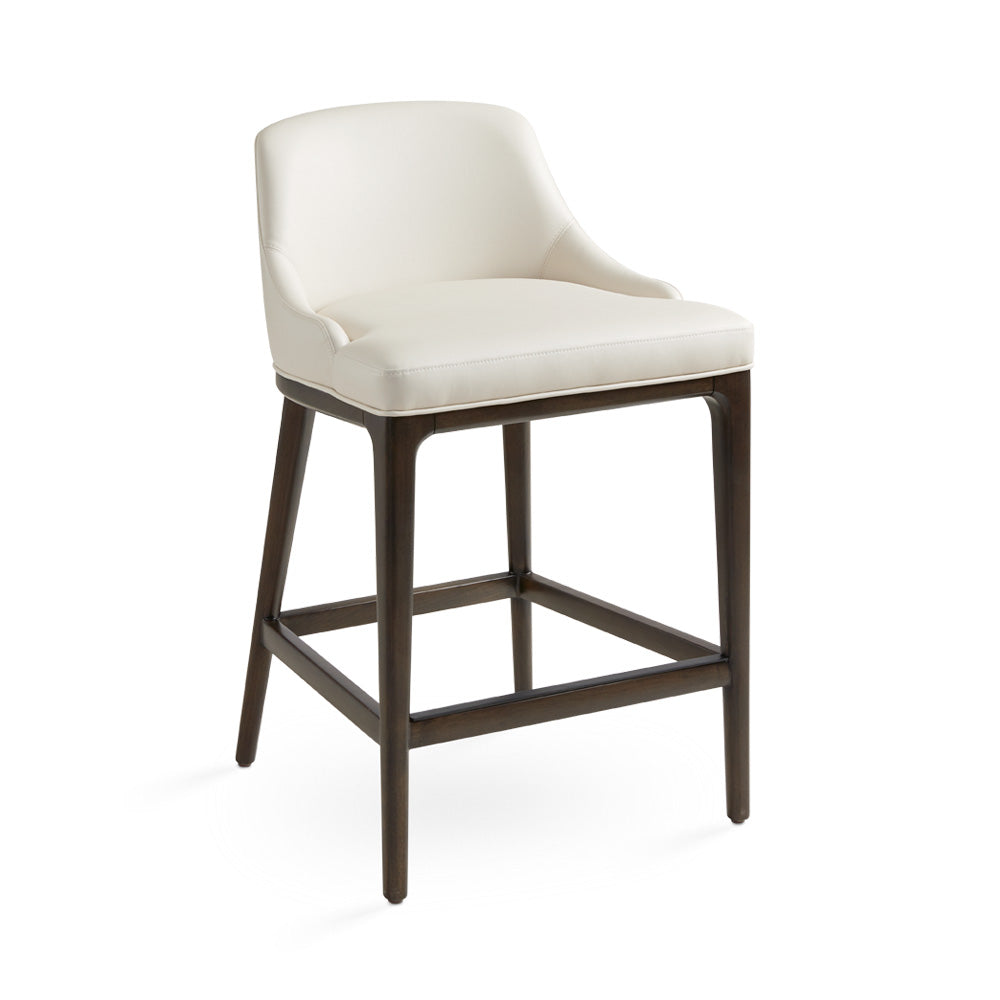 Everett counter chair in taupe leatherette with wooden legs, modern dining stool by Xcella, three-quarter view showing seating and design.