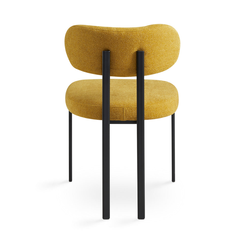 Xcella Otis Yellow Mustard Dining Chair with modern design, showcasing the comfortable upholstered seat and sleek wooden legs.