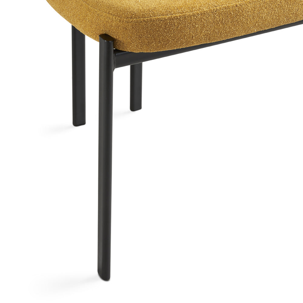 Xcella Otis yellow mustard dining chair with sleek modern design, showcasing a comfortable upholstered seat and wooden legs.