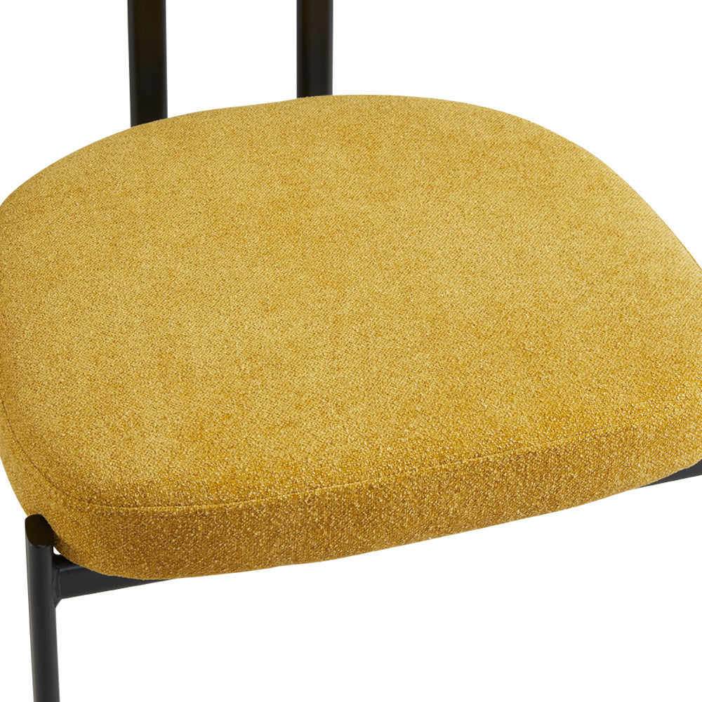 Yellow Mustard Otis Dining Chair by Xcella, showcasing a modern, upholstered dining chair with sleek design and wooden legs.