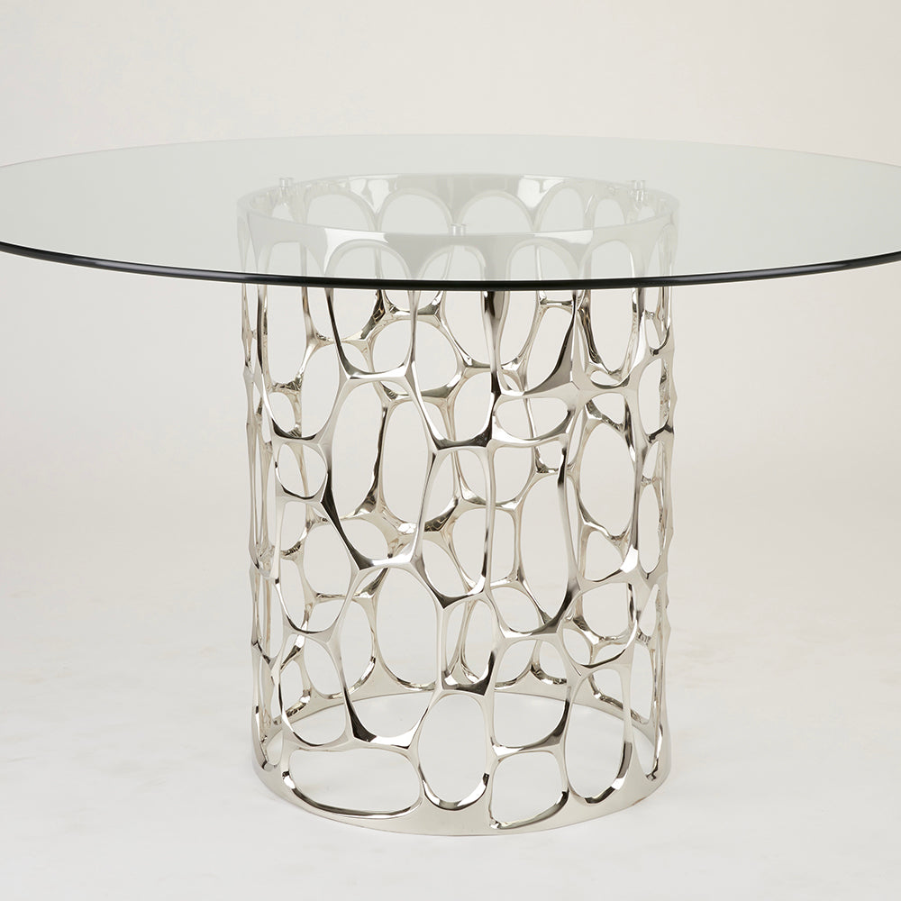 Black Mario dining table by Xcella, showcasing a sleek modern design with a smooth surface and sturdy legs.