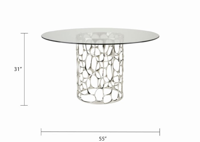 Black Mario dining table by Xcella with sleek silver base, modern design, and spacious surface for dining area.
