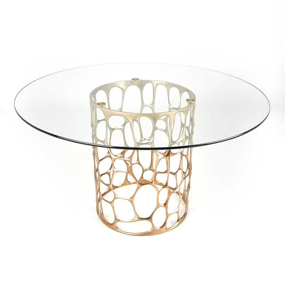 Xcella Mario 5-piece dining table set with gold and ivory finish, featuring a stylish table and matching chairs in a modern dining room.