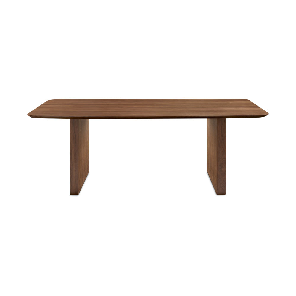 Xcella Pauline dining table with a sleek wooden surface and sturdy legs, ideal for modern dining rooms.