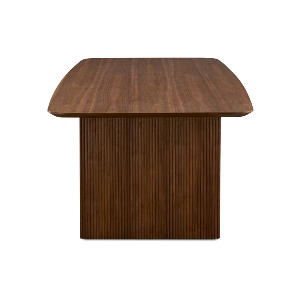 Xcella Pauline dining table floor model with wooden top and sturdy legs, ideal for modern dining rooms.