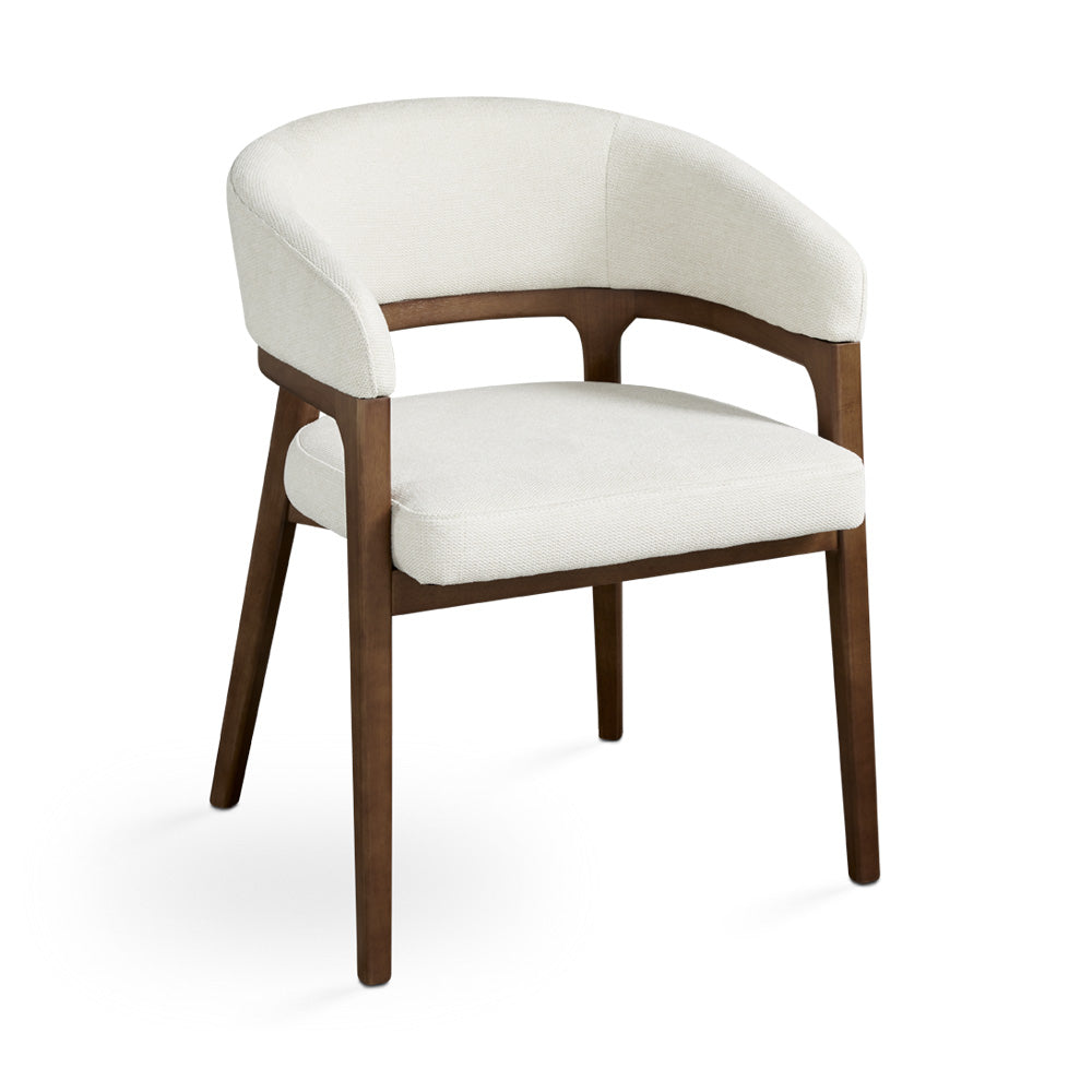 White Xcella Chanler dining chair with modern design, featuring a sleek wooden frame and cushioned seat for kitchen and dining room.