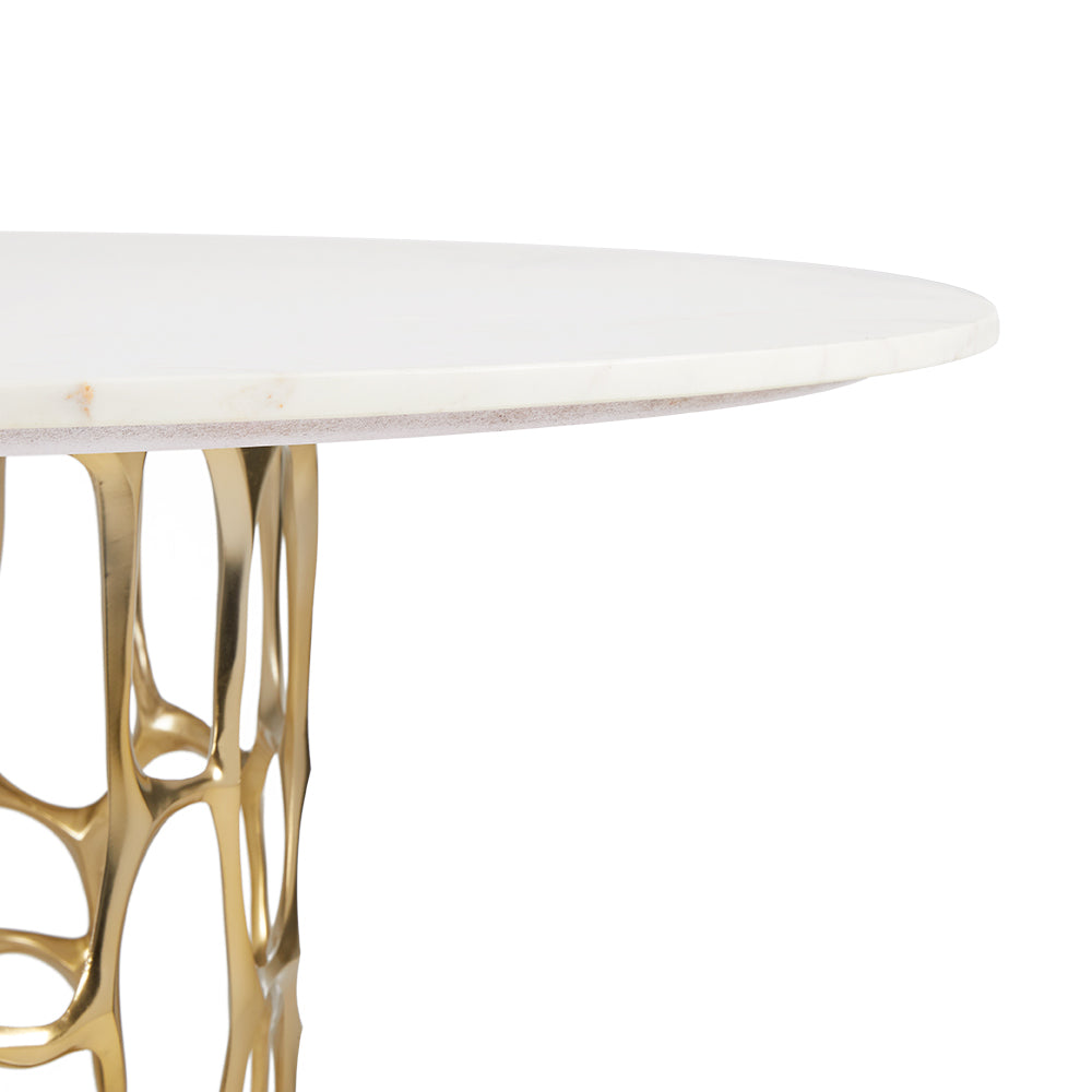 Xcella Mario marble dining table with gold base, showcasing a sleek edge design for kitchen and dining room decor.
